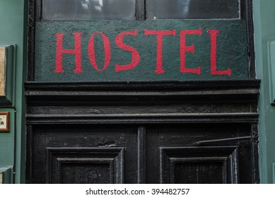 Hostel signboard on the old vintage door - Powered by Shutterstock