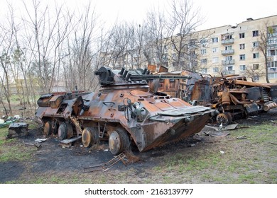 Hostomel, Ukraine - April 9, 2022. War In Ukraine. Destroyed Military Vehicles And Equipment.  Urban Warfare