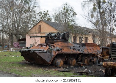 Hostomel, Ukraine - April 9, 2022. War In Ukraine. Destroyed Military Vehicles And Equipment.  Urban Warfare