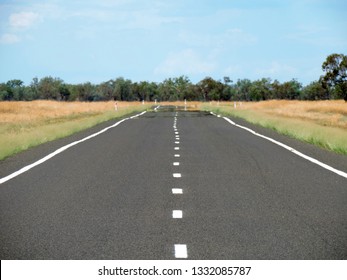 Hot Air Above Road. Mirage. Close Up Of A Distorted Outback Sealed Road Scorching With Heat In Midday Near Bourke, New South Wales, Australia.