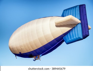 Hot Air Airship - Blimp In Front Of Blue Sky