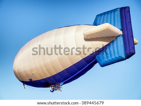 hot air airship - blimp in front of blue sky