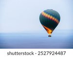 Hot air balloon being raised in the Masai Mara National Park