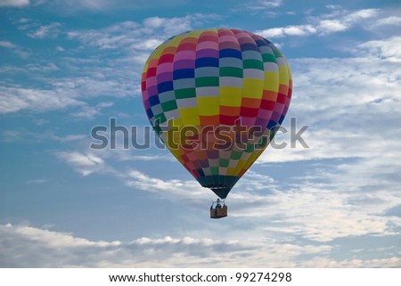 Hot air balloon in clear blue morning sky