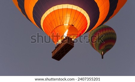 Hot Air Balloon Flames Burning Rising into Blue Sky - Bottom view of hot air blower