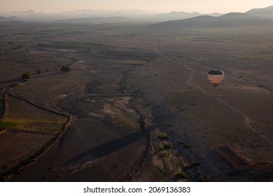 A Hot Air Balloon Flight At Sunrise In Morocco Near Marrakech.