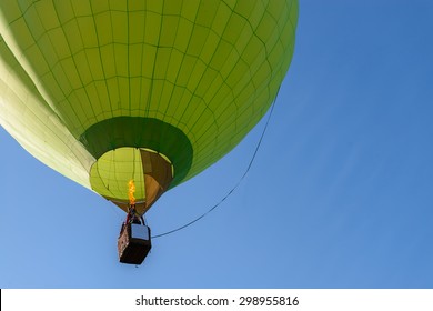 Hot air balloon flight view from below in the blue sky