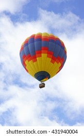  Hot air balloon floating over Temecula valley orchards and wine vineyards in Southern California                              