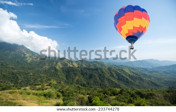 Hot Air Balloon Over Mountain Blue Stock Photo (Edit Now) 233744278