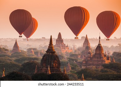 Hot air balloon over plain of Bagan in misty morning, Myanmar - Powered by Shutterstock