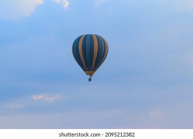 Hot Air Balloon Over The Serengeti National Park In Tanzania At Sunrise