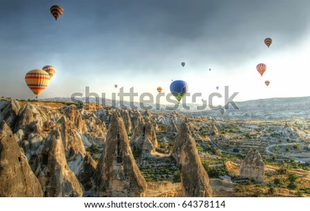 Hot air balloons above a gorgeous landscape