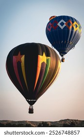 Hot air balloons above the Medora North Dakota Badlands at hot air balloon festival at sunrise