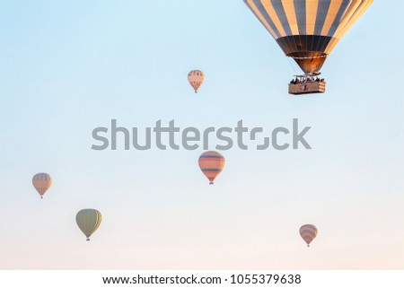 Hot air balloons in the blue sky, active leisure or adventure of a dream concept