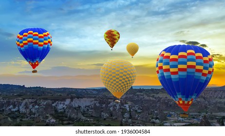 Hot air balloons colourful Flying over rock mountain valley Göreme. Panoramic view of Cappadocia, Turkey
