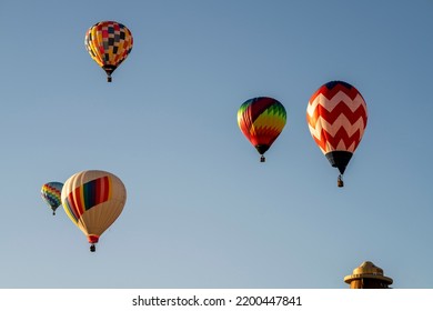 Hot Air Balloons floating in the sky - Powered by Shutterstock