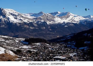 Hot Air Balloons In The French Alps.  Aerial View Of Megeve.  France. 