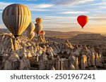 Hot air balloons at the sunrise in Cappadocia, Turkey