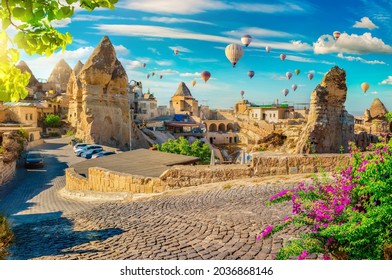 Hot air balloons at sunset in Goreme village, Cappadocia, Turkey - Shutterstock ID 2036868146