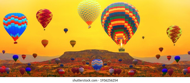 Hot air balloons. Balloons tour above high mountain at sunset. Cappadocia at sunrise Adventures on Turkey.