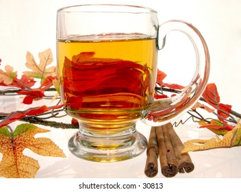 Hot Apple Cider And Cinnamon Sticks.