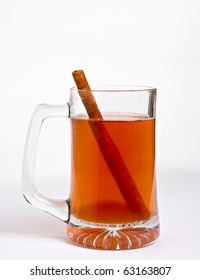 Hot Apple Cider In Clear Glass With Cinnamon Stick