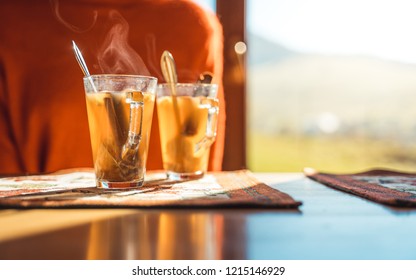 Hot Apple Cider With Woman In The Background