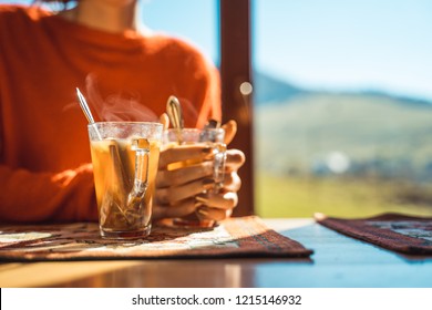 Hot Apple Cider With Woman In The Background