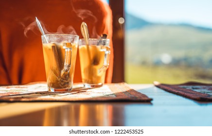 Hot Apple Cider With Woman In The Background