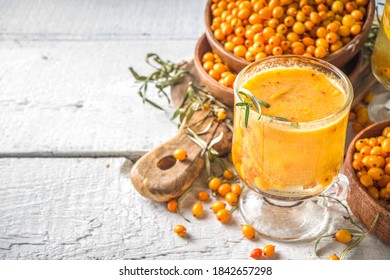 Hot Autumn Organic Drink. Healthy Diet Beverage, Immunity Buster Food. Sea Buckthorn Tea With Orange And Honey In A Glass Cups. White Background Copy Space