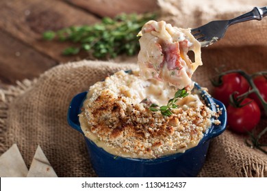 Hot Baked Dip With Caramelized Onion, Bacon And Cheese On Rustic Background