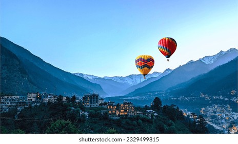Hot balloon air over Manali, beautiful little town in Himalayas in Himachal India.