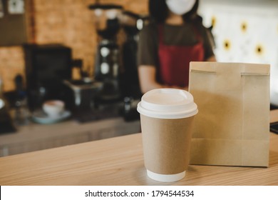 Hot Black Coffee Cup And Dessert Paper Bag Waiting For Customer On Counter In Modern Cafe Coffee Shop, Food Delivery, Cafe Restaurant, Takeaway Food, Small Business Owner, Food And Drink Concept