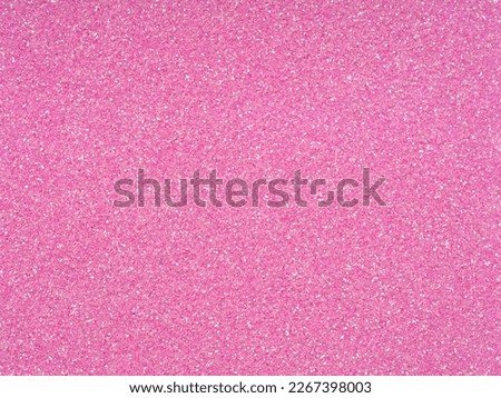 Hot bright pink color glitter sparkle confetti background for happy birthday party invite card, Christmas, xmas holiday seasonal wallpaper decoration, greeting, wedding invitation card design element.