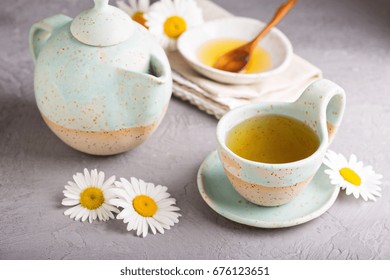 Hot Camomille Tea With Honey In Handmade Ceramic Cup