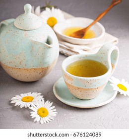 Hot Camomille Tea With Honey In Handmade Ceramic Cup