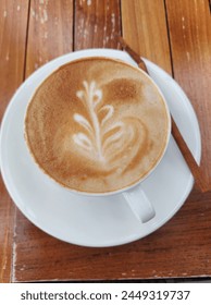 Hot cappucino, less sugar, low fat milk and extra shot. It's perfecto cappucino.
