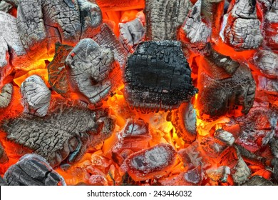 Hot Charcoal With Bright Flames In BBQ Pit