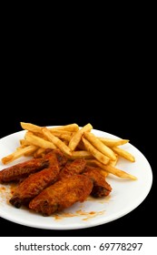 Hot Chicken Wings And French Fries On White Plate With Black Background