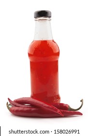 Hot Chili Pepper Sauce On A White