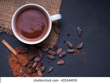 Hot Chocolate In A Cup, Dark Styled Photo, Top View
