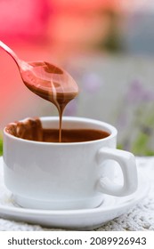 Hot Chocolate Cup On Table At Cafe Outdoors Summer. Coffee Time And Breakfast In Restaurant. Chocolate, Hot Frothed Milk, Cocoa. Street Cafe. Milk Dark Chocolate