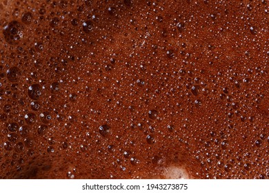 Hot Chocolate Foam Close-up, Macro. Abstract Background. Black Coffee With Milk Cream Foam Texture. Flat Lay