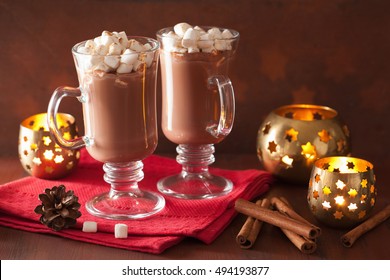 hot chocolate with mini marshmallows cinnamon winter drink candles - Powered by Shutterstock