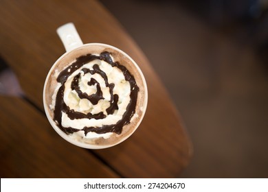 Hot Chocolate With Whipped Cream On Wooden Table, Top View