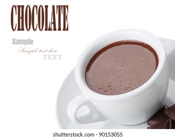 Hot Chocolate In White Cups With Chocolate Bar Over White Background