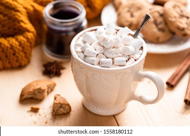 Hot Chocolate In White Mug With Marshmallows On Wooden Table. Comfort Food