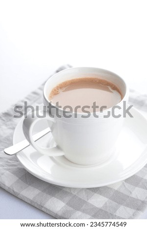 hot cocoa chocolate, milk tea, milk coffee kopi mocha latte cappuccino in white cup on grey cloth white background asian beverage halal food drink menu for hotel bar