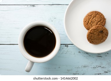 hot coffee and cookie on the table