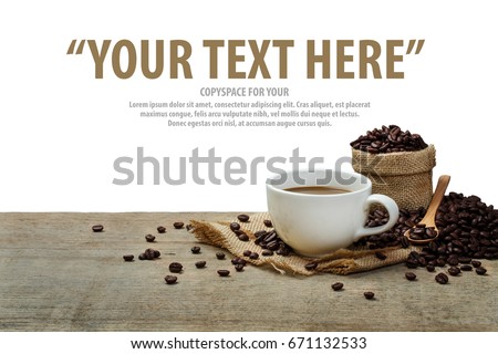 Hot Coffee cup with coffee beans roating on the wooden table and the white background with copyspace for your text.